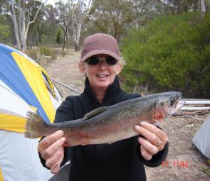 Leeanne Rieniets with a 650g rainbow trout from Lake Wartook.